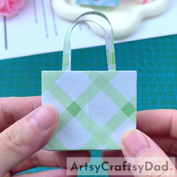 Let It Dry- Instructions for crafting a paper origami tote bag to use as a present