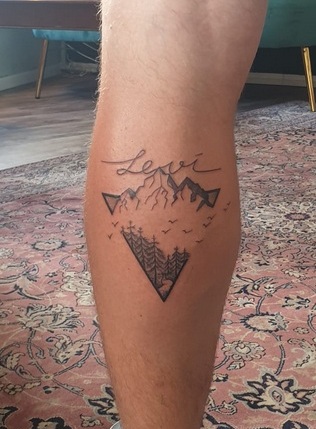 Thoughtful Triangle Shape Tattoo With Nature-20 Thrilling Triangle Tattoo Designs for the Year 2023