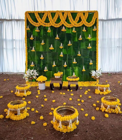 Banana Leaf And Yellow Marigold Decoration Ideas For Seemantham-Sprucing up the Seemantham in the home for 2023 with fifteen ideas