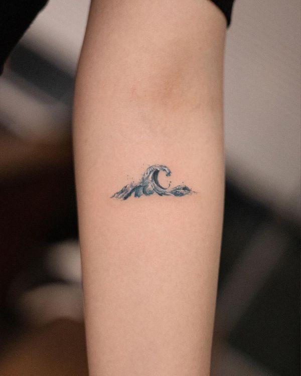 Classy Wave Tattoos On The Forearm