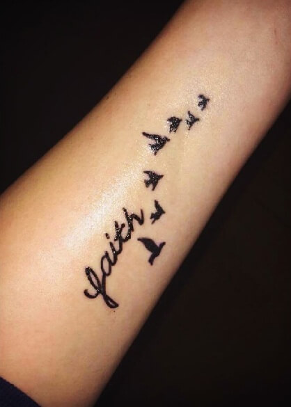Effortless Faith Tattoo On Hand With Birds-Represent Your Beliefs with Faithful Tattoo Ideas 