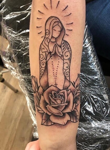 Elegant Catholic Tattoo