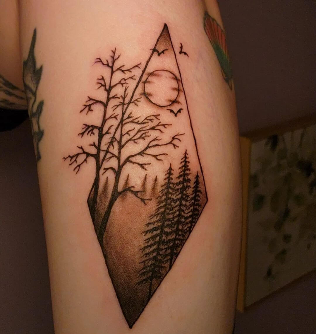 Night View Forest Tattoo On The Bicep-