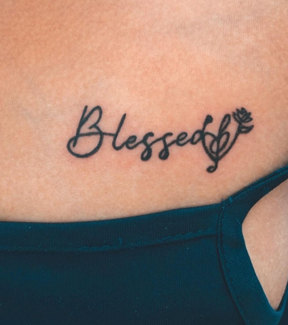 Pretty Blessed Tattoo On Chest