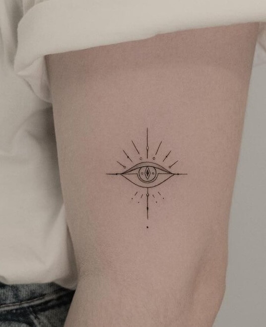 Dainty Small Evil Eye Tattoo Design 