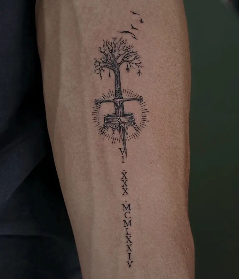 Powerful Sword and Crown Tattoo Design on Forearm