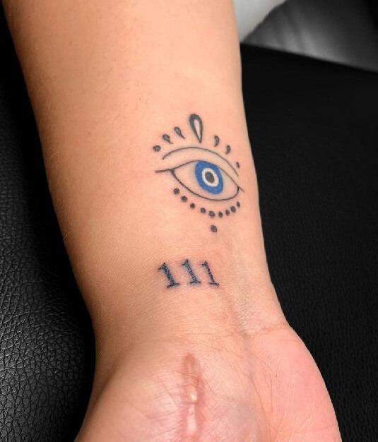 Stylish Evil Eye Wrist Small Tattoo Design 