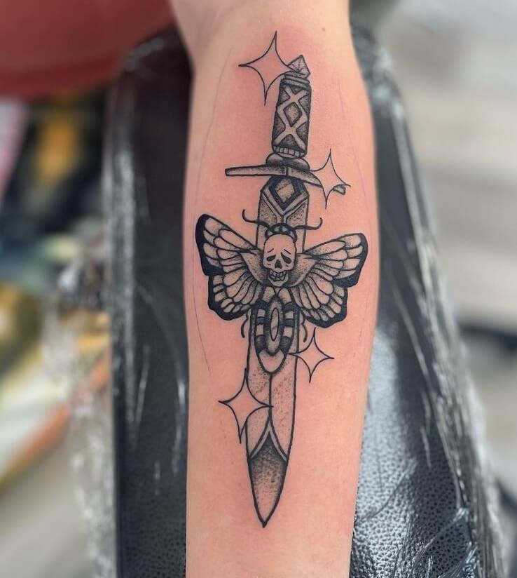 Unique & Dynamic Sword Tattoo Design With  Skull and Butterfly